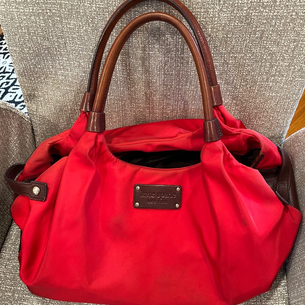 Kate Spade red nylon small weekend bag